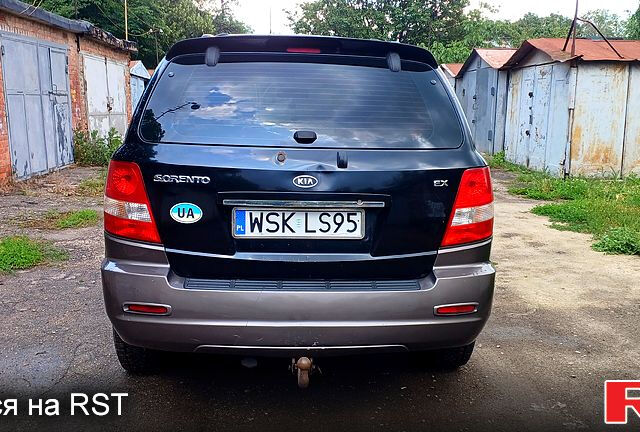 Черный Киа Соренто, объемом двигателя 2.5 л и пробегом 350 тыс. км за 4000 $, фото 2 на Automoto.ua