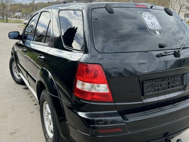 Черный Киа Соренто, объемом двигателя 2.5 л и пробегом 283 тыс. км за 5100 $, фото 4 на Automoto.ua