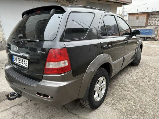 Черный Киа Соренто, объемом двигателя 2.5 л и пробегом 370 тыс. км за 4999 $, фото 2 на Automoto.ua