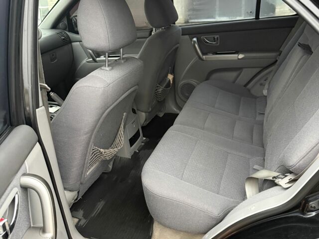 Черный Киа Соренто, объемом двигателя 2.5 л и пробегом 403 тыс. км за 3400 $, фото 5 на Automoto.ua