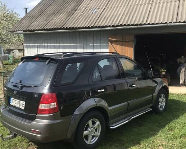 Черный Киа Соренто, объемом двигателя 2.5 л и пробегом 262 тыс. км за 9200 $, фото 29 на Automoto.ua