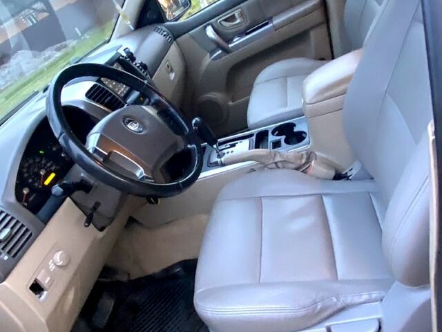 Чорний Кіа Соренто, об'ємом двигуна 2.5 л та пробігом 216 тис. км за 6200 $, фото 4 на Automoto.ua