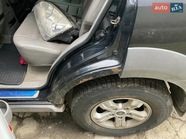 Черный Киа Соренто, объемом двигателя 2.5 л и пробегом 220 тыс. км за 4500 $, фото 5 на Automoto.ua