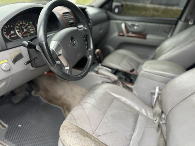 Черный Киа Соренто, объемом двигателя 2.5 л и пробегом 285 тыс. км за 3000 $, фото 4 на Automoto.ua