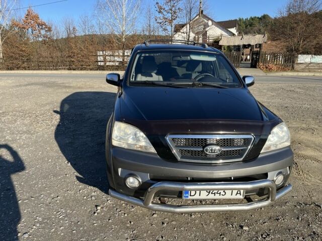 Черный Киа Соренто, объемом двигателя 2.4 л и пробегом 205 тыс. км за 6650 $, фото 1 на Automoto.ua