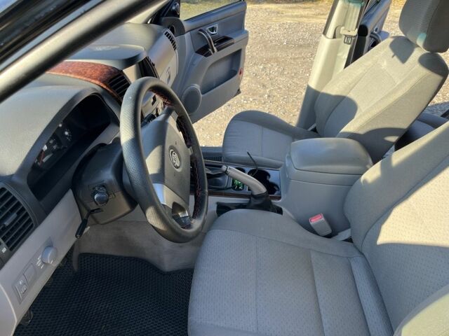 Черный Киа Соренто, объемом двигателя 2.4 л и пробегом 205 тыс. км за 6650 $, фото 2 на Automoto.ua