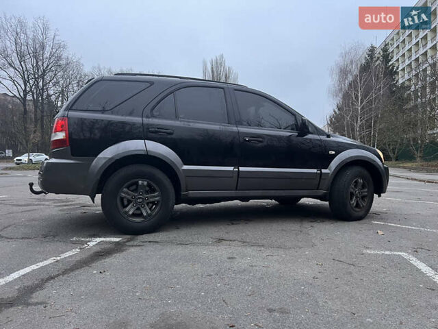 Черный Киа Соренто, объемом двигателя 2.5 л и пробегом 340 тыс. км за 7500 $, фото 19 на Automoto.ua
