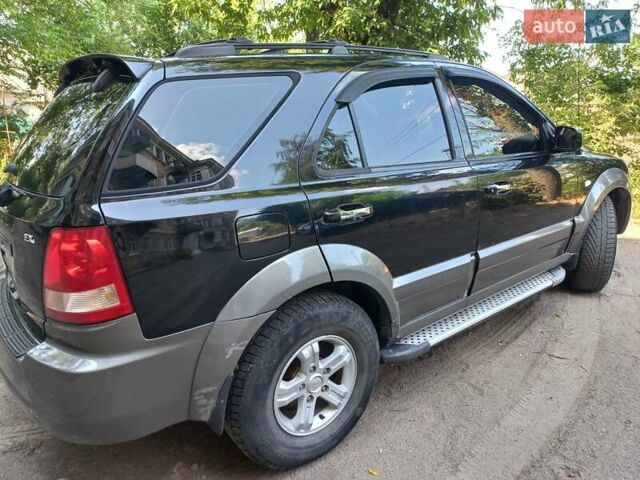 Чорний Кіа Соренто, об'ємом двигуна 2.4 л та пробігом 230 тис. км за 6800 $, фото 2 на Automoto.ua