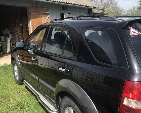 Черный Киа Соренто, объемом двигателя 2.5 л и пробегом 262 тыс. км за 9200 $, фото 39 на Automoto.ua