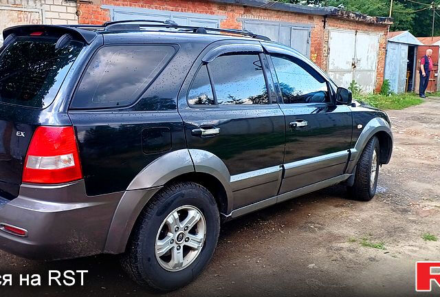 Черный Киа Соренто, объемом двигателя 2.5 л и пробегом 350 тыс. км за 4000 $, фото 6 на Automoto.ua