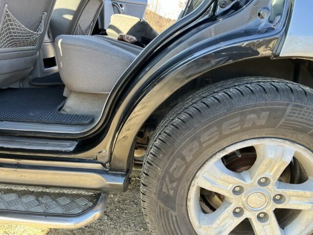 Черный Киа Соренто, объемом двигателя 2.4 л и пробегом 205 тыс. км за 6650 $, фото 11 на Automoto.ua