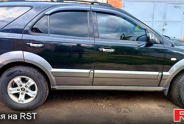 Черный Киа Соренто, объемом двигателя 2.5 л и пробегом 350 тыс. км за 4000 $, фото 4 на Automoto.ua