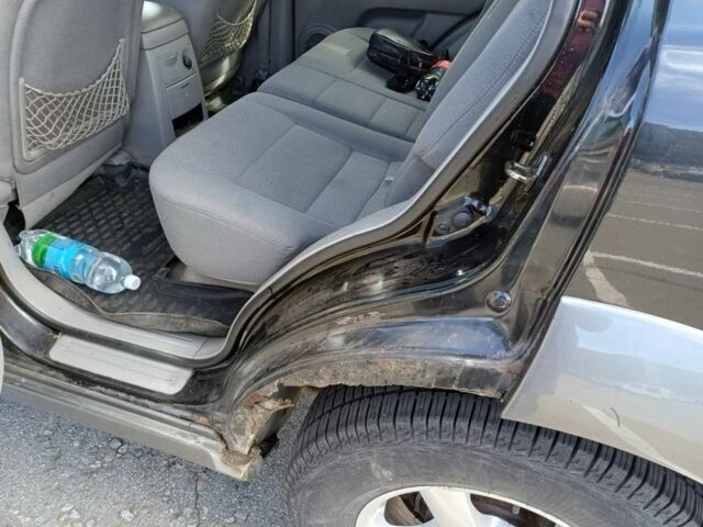 Черный Киа Соренто, объемом двигателя 2.5 л и пробегом 327 тыс. км за 3400 $, фото 7 на Automoto.ua