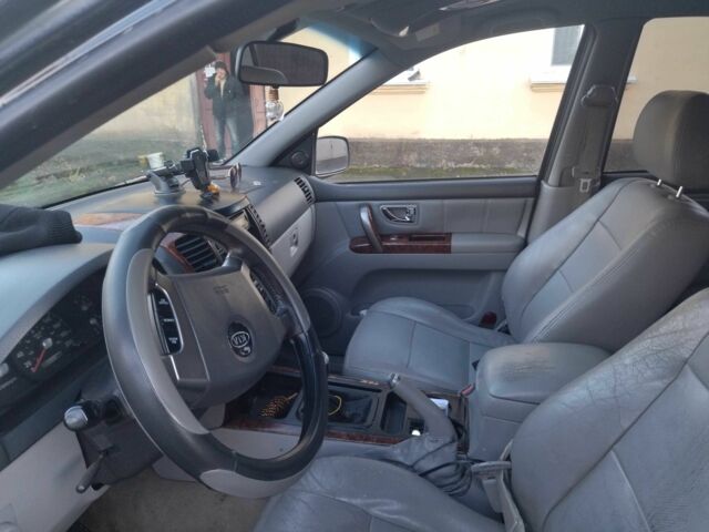 Черный Киа Соренто, объемом двигателя 2.5 л и пробегом 303 тыс. км за 3546 $, фото 3 на Automoto.ua