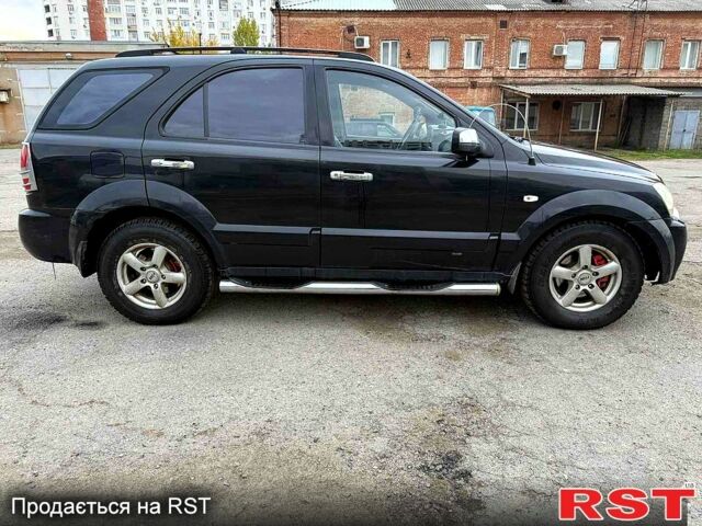 Черный Киа Соренто, объемом двигателя 2.5 л и пробегом 254 тыс. км за 3700 $, фото 4 на Automoto.ua