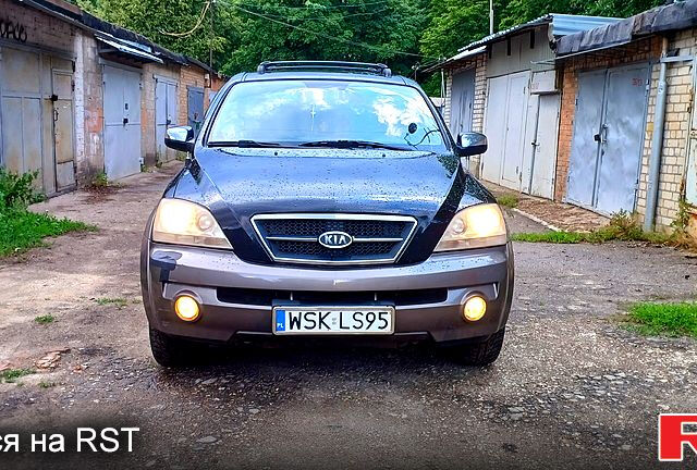 Черный Киа Соренто, объемом двигателя 2.5 л и пробегом 350 тыс. км за 4000 $, фото 3 на Automoto.ua