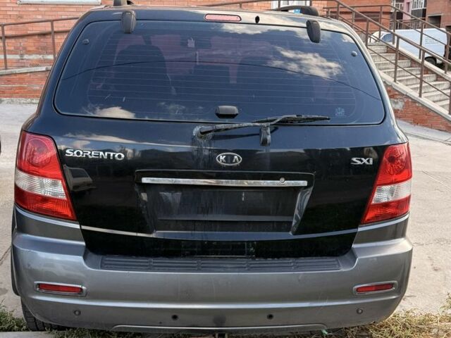 Черный Киа Соренто, объемом двигателя 2.5 л и пробегом 217 тыс. км за 5515 $, фото 3 на Automoto.ua