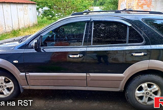 Черный Киа Соренто, объемом двигателя 2.5 л и пробегом 350 тыс. км за 4000 $, фото 5 на Automoto.ua