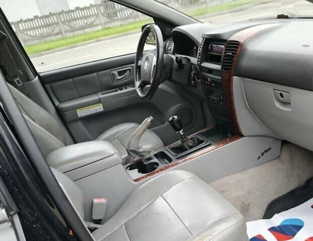 Черный Киа Соренто, объемом двигателя 2.5 л и пробегом 302 тыс. км за 4300 $, фото 5 на Automoto.ua