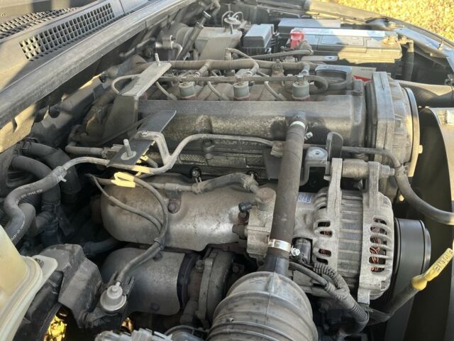 Черный Киа Соренто, объемом двигателя 2.5 л и пробегом 236 тыс. км за 8000 $, фото 12 на Automoto.ua