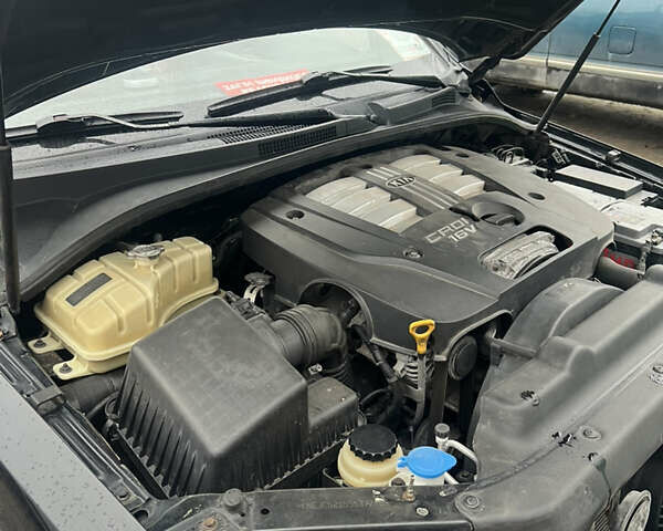 Черный Киа Соренто, объемом двигателя 2.5 л и пробегом 140 тыс. км за 7500 $, фото 7 на Automoto.ua