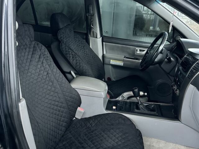 Черный Киа Соренто, объемом двигателя 2.5 л и пробегом 350 тыс. км за 3750 $, фото 5 на Automoto.ua