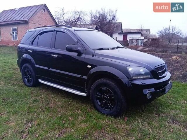 Черный Киа Соренто, объемом двигателя 3.5 л и пробегом 230 тыс. км за 6999 $, фото 6 на Automoto.ua