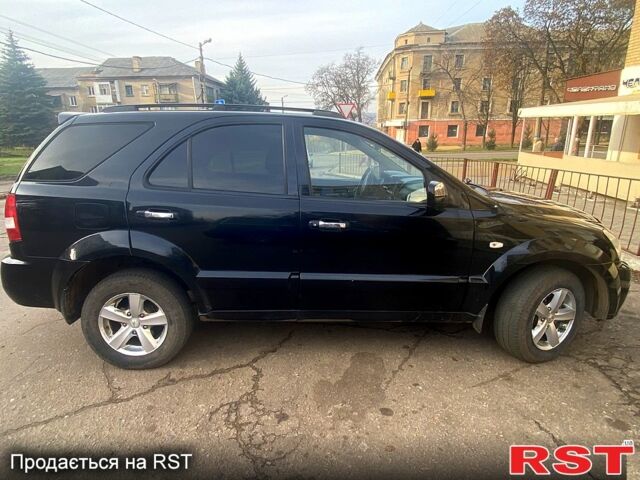 Чорний Кіа Соренто, об'ємом двигуна 2.5 л та пробігом 325 тис. км за 4300 $, фото 2 на Automoto.ua