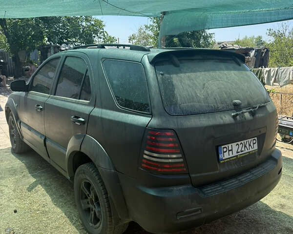 Черный Киа Соренто, объемом двигателя 2.5 л и пробегом 412 тыс. км за 3500 $, фото 4 на Automoto.ua