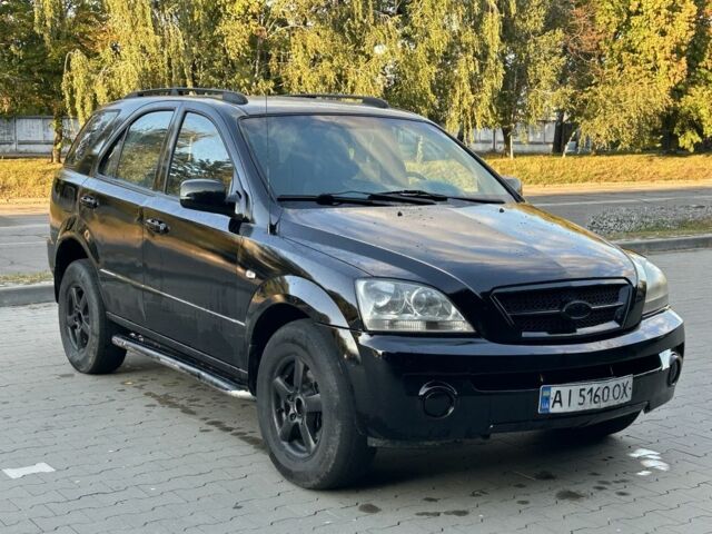 Чорний Кіа Соренто, об'ємом двигуна 2.5 л та пробігом 300 тис. км за 3150 $, фото 6 на Automoto.ua