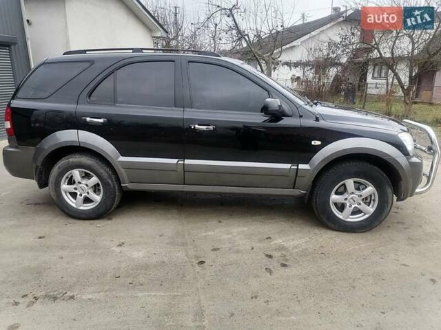Чорний Кіа Соренто, об'ємом двигуна 2.5 л та пробігом 294 тис. км за 7400 $, фото 8 на Automoto.ua