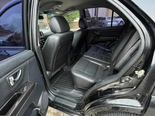 Черный Киа Соренто, объемом двигателя 2.5 л и пробегом 265 тыс. км за 2400 $, фото 4 на Automoto.ua