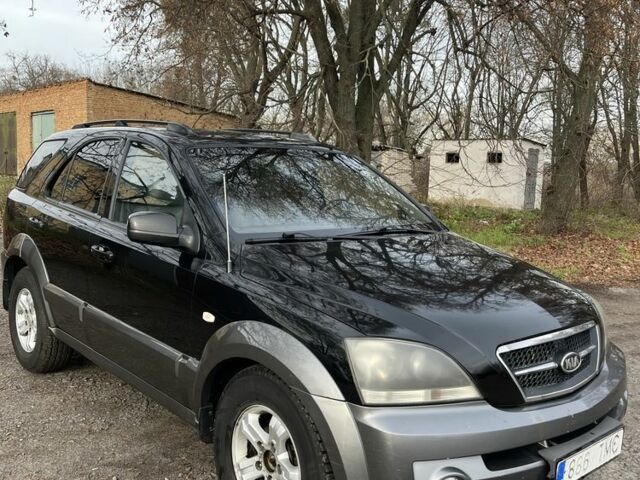 Черный Киа Соренто, объемом двигателя 2.5 л и пробегом 244 тыс. км за 4750 $, фото 1 на Automoto.ua
