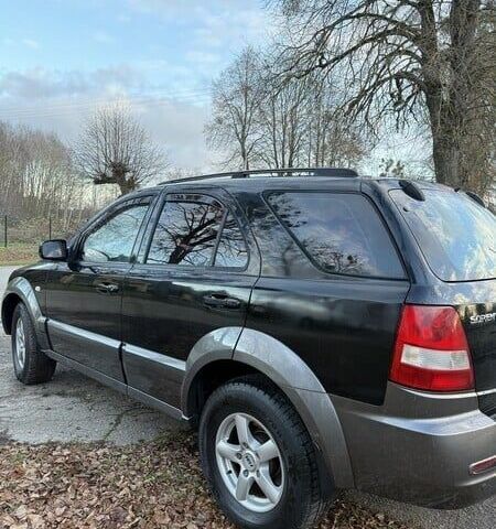 Черный Киа Соренто, объемом двигателя 2.5 л и пробегом 253 тыс. км за 2700 $, фото 2 на Automoto.ua