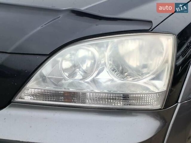 Чорний Кіа Соренто, об'ємом двигуна 2.4 л та пробігом 300 тис. км за 6480 $, фото 4 на Automoto.ua