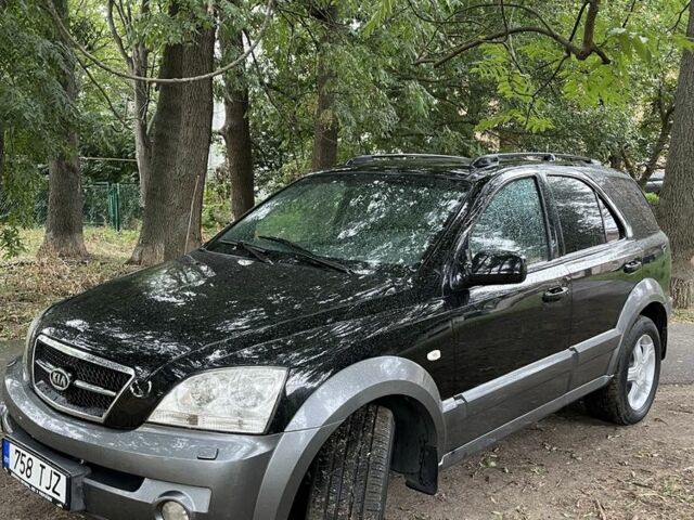 Черный Киа Соренто, объемом двигателя 2.5 л и пробегом 250 тыс. км за 5000 $, фото 2 на Automoto.ua