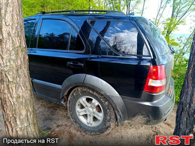 Черный Киа Соренто, объемом двигателя 2.5 л и пробегом 338 тыс. км за 3800 $, фото 2 на Automoto.ua