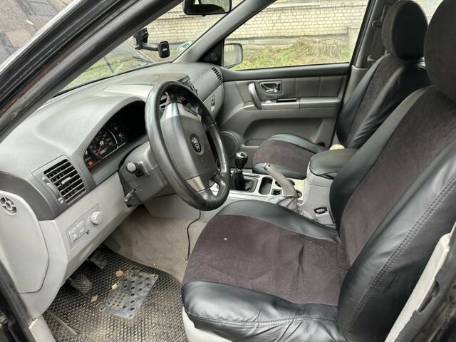 Черный Киа Соренто, объемом двигателя 2.5 л и пробегом 327 тыс. км за 6200 $, фото 5 на Automoto.ua