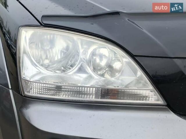 Чорний Кіа Соренто, об'ємом двигуна 2.4 л та пробігом 300 тис. км за 6480 $, фото 5 на Automoto.ua