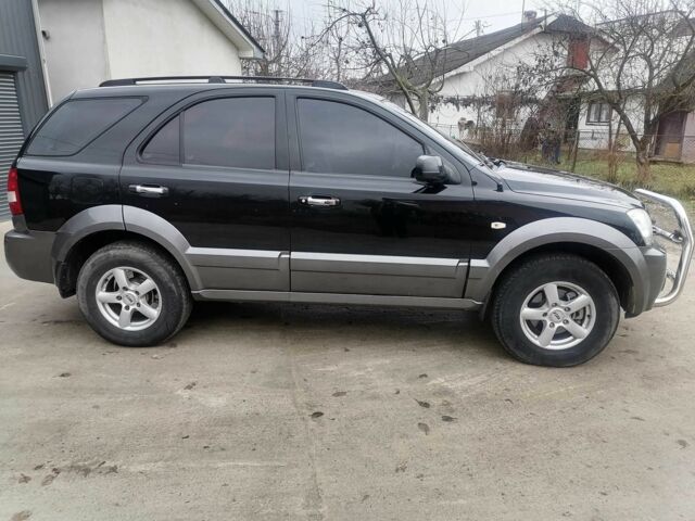 Чорний Кіа Соренто, об'ємом двигуна 2.5 л та пробігом 294 тис. км за 7400 $, фото 16 на Automoto.ua