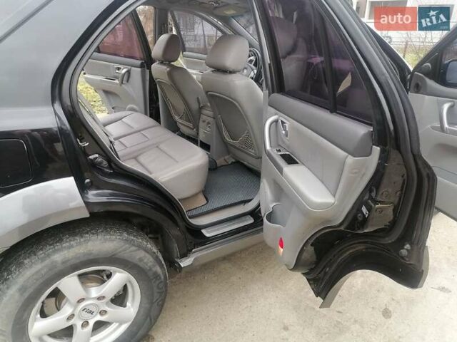 Чорний Кіа Соренто, об'ємом двигуна 2.5 л та пробігом 294 тис. км за 7400 $, фото 13 на Automoto.ua