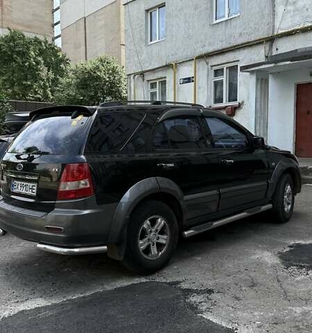 Черный Киа Соренто, объемом двигателя 2.4 л и пробегом 211 тыс. км за 6800 $, фото 2 на Automoto.ua