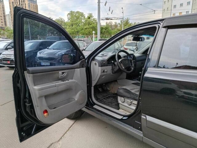 Черный Киа Соренто, объемом двигателя 2.4 л и пробегом 300 тыс. км за 6490 $, фото 13 на Automoto.ua