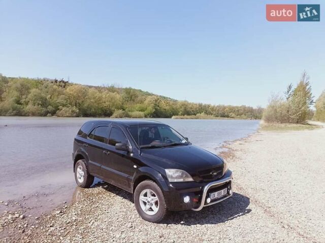 Черный Киа Соренто, объемом двигателя 2.4 л и пробегом 287 тыс. км за 8999 $, фото 7 на Automoto.ua