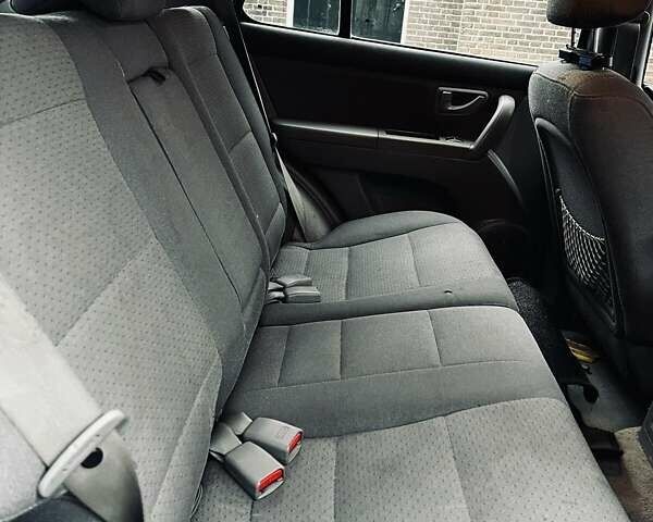 Чорний Кіа Соренто, об'ємом двигуна 2.5 л та пробігом 180 тис. км за 7200 $, фото 5 на Automoto.ua