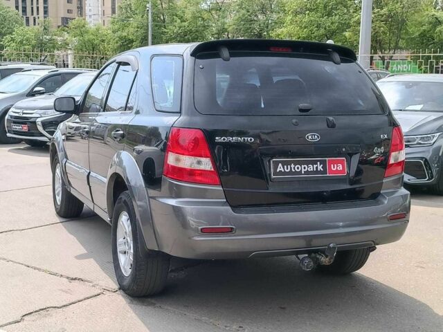 Черный Киа Соренто, объемом двигателя 2.4 л и пробегом 300 тыс. км за 6490 $, фото 4 на Automoto.ua