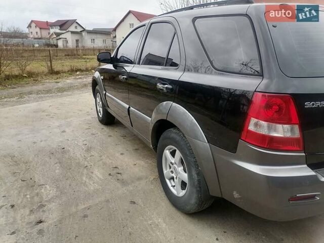 Чорний Кіа Соренто, об'ємом двигуна 2.5 л та пробігом 294 тис. км за 7400 $, фото 6 на Automoto.ua