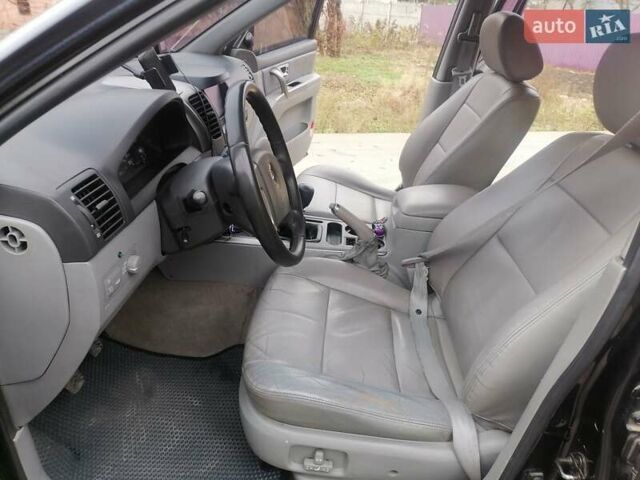 Чорний Кіа Соренто, об'ємом двигуна 2.5 л та пробігом 294 тис. км за 7400 $, фото 12 на Automoto.ua