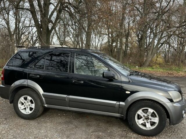 Черный Киа Соренто, объемом двигателя 2.5 л и пробегом 244 тыс. км за 4750 $, фото 2 на Automoto.ua