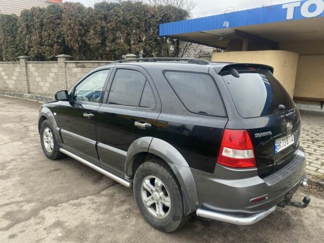 Черный Киа Соренто, объемом двигателя 2.5 л и пробегом 300 тыс. км за 6820 $, фото 4 на Automoto.ua